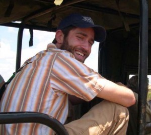 Aaron Bruner riding an open vehicle