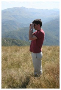 Man using a pair of binoculars