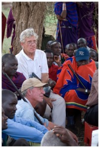 Tom Hill with people from a village